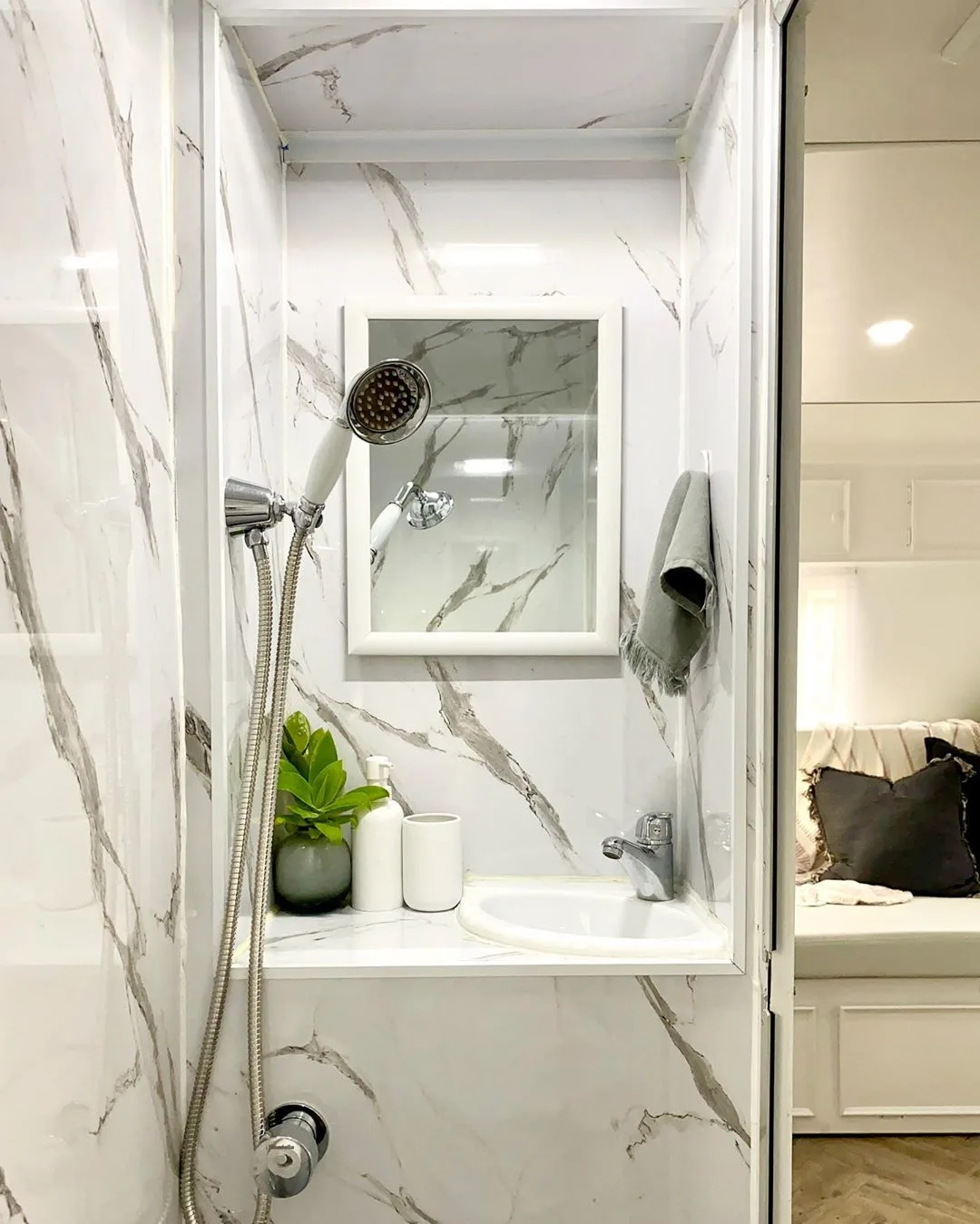 Luxurious bathroom inside a renovated vintage caravan