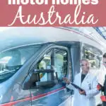Two male technicians talking beside an RV, with the text: The best motorhomes Australia 2023.