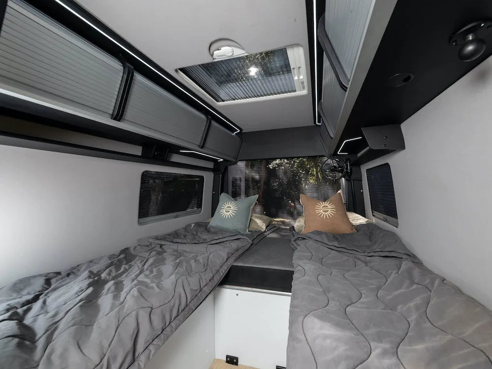 Bedroom area inside the Trakka Akuna van motorhome.