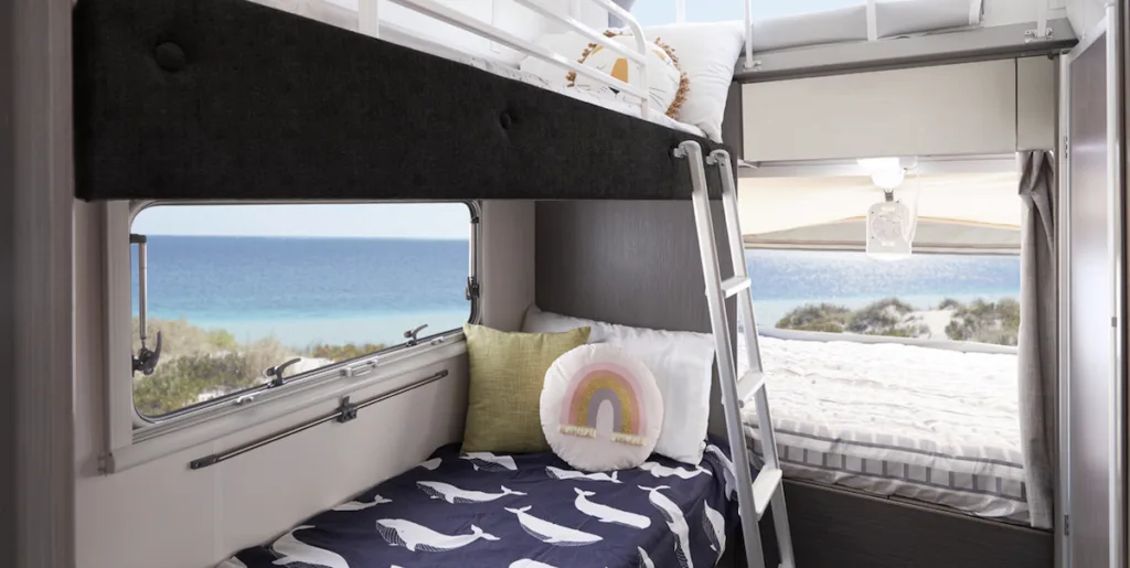 Interior of the Jayco Expanda 17.56-2 pop top caravan showing the bunk beds.